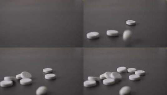 白色的药片掉落在桌面上高清在线视频素材下载