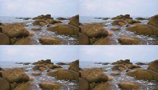 海南三亚海边沙滩海浪拍打礁石高清在线视频素材下载