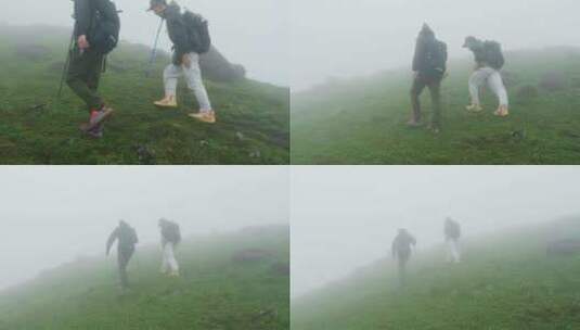 徒步攀登高山迷雾中行走团队战胜困难高清在线视频素材下载