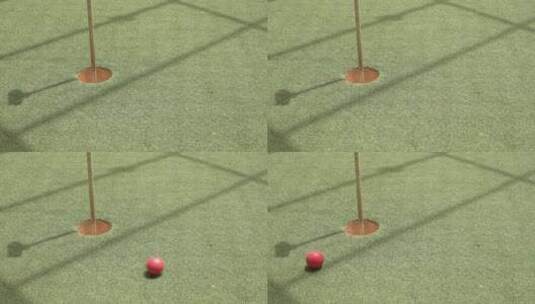 高尔夫球手在迷你高尔夫球场用几杆将高尔夫高清在线视频素材下载