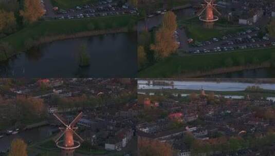 荷兰城市、风车、河流和日落的鸟瞰图。高清在线视频素材下载