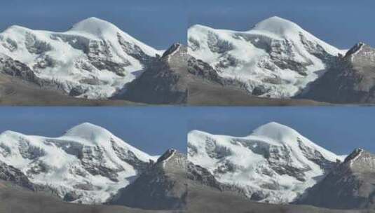 长焦下的西藏念青唐古拉山脉雪山山峰景观高清在线视频素材下载