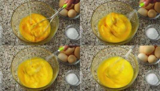 打蛋器搅拌鸡蛋节食玻璃材料桌子高清在线视频素材下载
