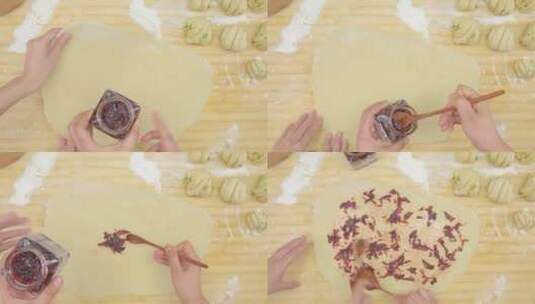 用勺子把玫瑰花酱抹在面饼上高清在线视频素材下载