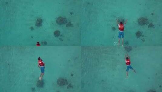 印尼大海海岛人游泳鱼航拍高清在线视频素材下载