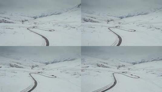 西藏旅游风光317国道白雪皑皑蜿蜒公路高清在线视频素材下载