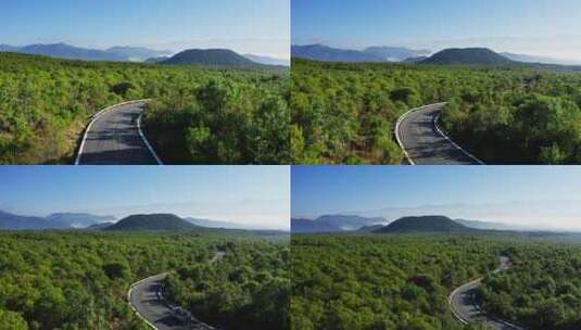 腾冲火山群中的绿色森林和公路高清在线视频素材下载