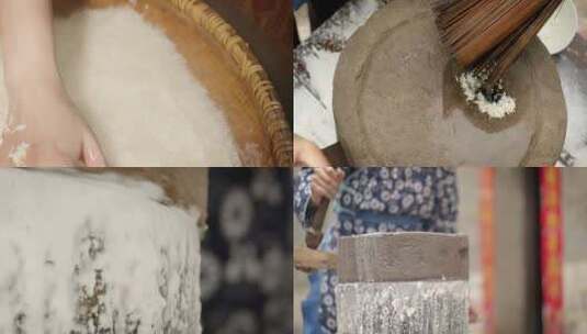 女人用石磨磨米粉高清在线视频素材下载