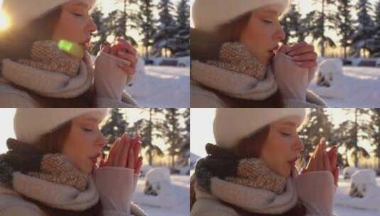 美女在雪地里搓手高清在线视频素材下载