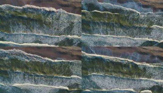 起泡的海浪与海岸线相撞高清在线视频素材下载