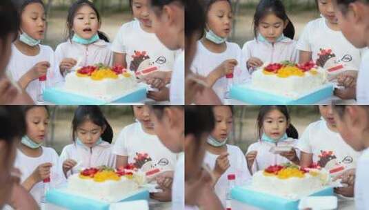 生日会上吃蛋糕的女孩高清在线视频素材下载