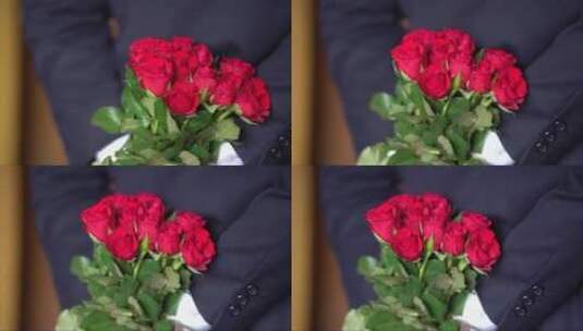 男人双手背后拿着玫瑰花高清在线视频素材下载