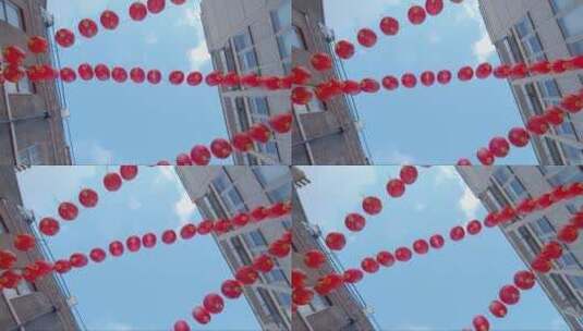 抬头看着悬挂在伦敦唐人街的红色中国灯笼高清在线视频素材下载