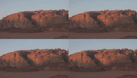 沙漠中的山脉全景。日落，日出。沙丘。干旱高清在线视频素材下载