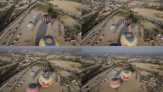 热气球节日落时彩色热气球降落的鸟瞰图（无高清在线视频素材下载