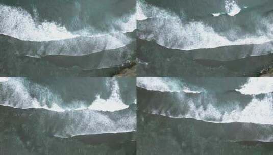 无人机飞越海滩上的海浪。高空飞行。自上而高清在线视频素材下载