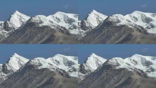 长焦下的西藏念青唐古拉山脉雪山山峰景观高清在线视频素材下载