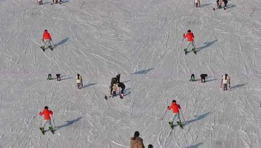 穿着红色外套的人在雪地上滑雪高清在线视频素材下载