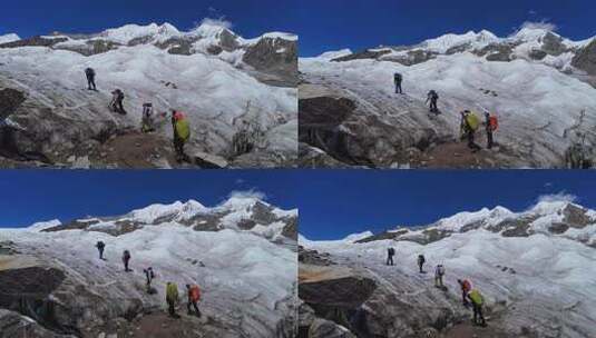 攀登四川第二高峰中山峰的登山队徒步冰塔林高清在线视频素材下载