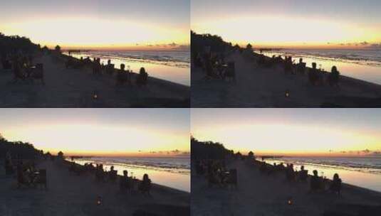 游客在海滩酒吧观看日落高清在线视频素材下载