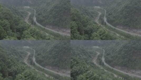 航拍大山中的公路高清在线视频素材下载
