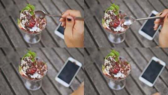 用勺子从玻璃杯中取出冰淇淋高清在线视频素材下载