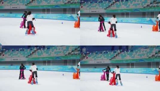 4K升格实拍两个在国家速滑馆滑冰的女孩高清在线视频素材下载