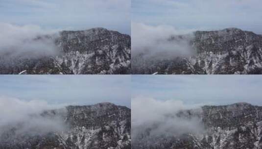 航拍佛教名山四川峨眉山，云海缭绕树林白雪高清在线视频素材下载