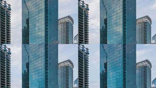 4K  青岛摩天大楼在蓝天白云下延时拍摄高清在线视频素材下载