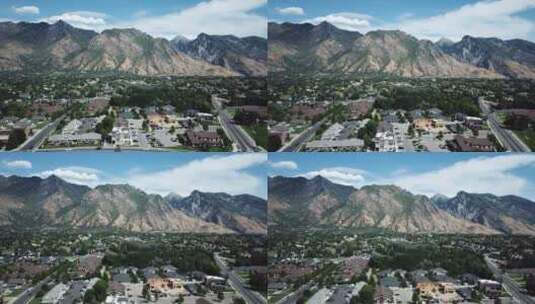 无人机在犹他州犹他州瓦萨奇山脉底部附近的一个街区上空飞行高清在线视频素材下载