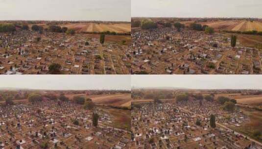 无人机拍摄了村庄旁边墓地的镜头高清在线视频素材下载