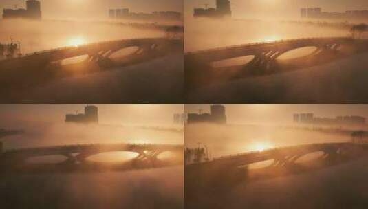 航拍日出晨雾中湖面上的桥梁与交通高清在线视频素材下载