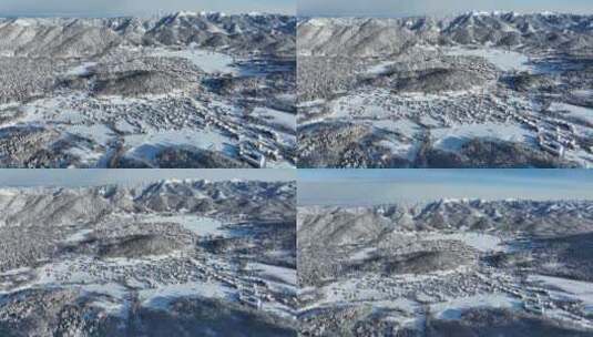 鸟瞰白雪覆盖的巴库里亚尼，周围是美丽的雪山。乔治亚州2021高清在线视频素材下载