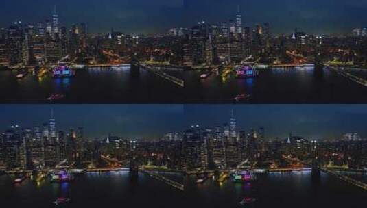 纽约的摩天大楼晚上灯火通明。从河边欣赏华高清在线视频素材下载
