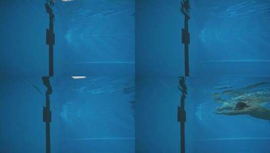 男子运动员泳池翻转的水下观察高清在线视频素材下载
