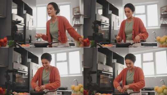 烹饪、视频博客和厨房里的女人，带摄像头直高清在线视频素材下载