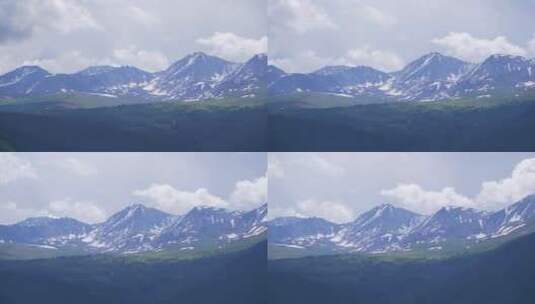 新疆北疆阿勒泰喀纳斯夏天雪山山脉自然风景高清在线视频素材下载