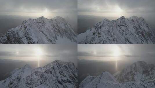 雪山云雾弥漫景象夕阳高清在线视频素材下载