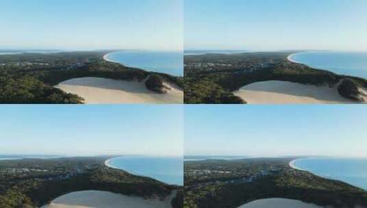 从高空无人机俯瞰卡罗沙子吹向澳大利亚昆士兰州锡坎湾高清在线视频素材下载