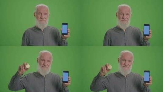 一位老人的绿屏肖像，手机带有蓝屏和BTC高清在线视频素材下载