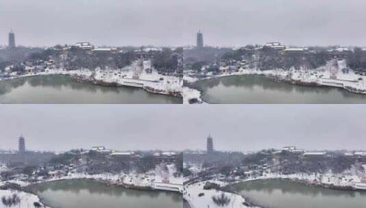 航拍瘦西湖景区园林大明寺观音山宋夹城雪景高清在线视频素材下载