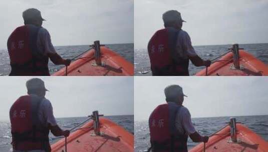 西沙群岛南海岛礁船夫船上地拍高清在线视频素材下载