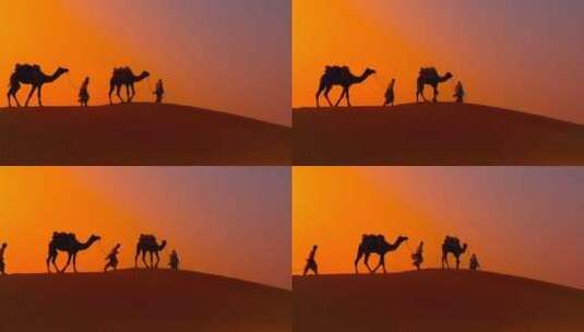 延时日落时分沙漠上的骆驼队剪影高清在线视频素材下载