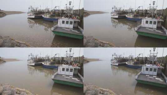 加拿大芬迪湾渔船停泊时海水涨潮高清在线视频素材下载