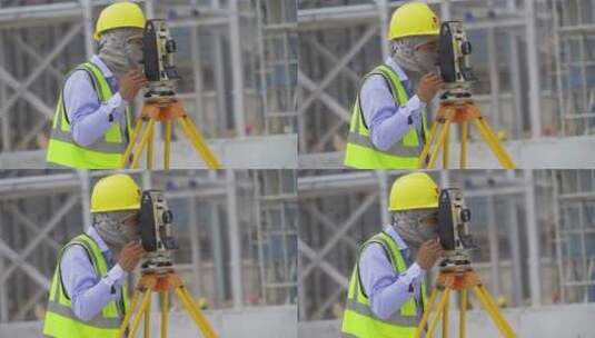 建筑工地工人施工经纬仪测量高清在线视频素材下载