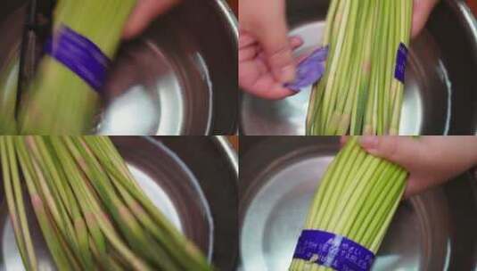 食材处理洗蒜苗择蒜薹切蒜薹高清在线视频素材下载