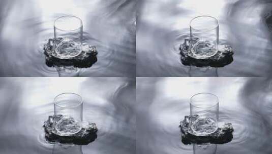 水面上的玻璃杯高清在线视频素材下载