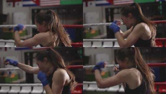 女拳击手在拳击场练习出拳高清在线视频素材下载