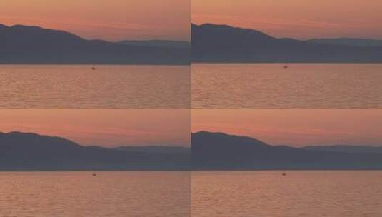 黄昏孤帆在海面行驶的唯美意境高清在线视频素材下载