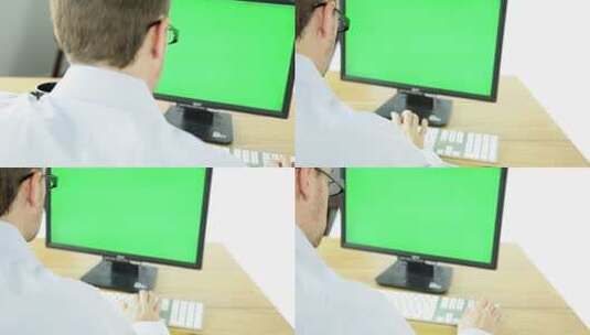 使用绿屏电脑的男人高清在线视频素材下载